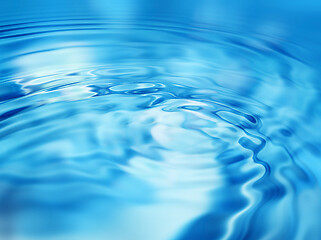 Image showing Bright blue abstract background with water ripples pattern