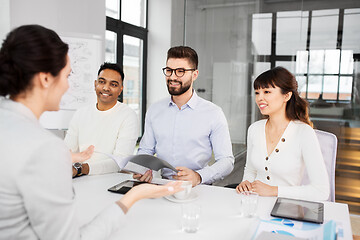 Image showing recruiters having job interview with employee