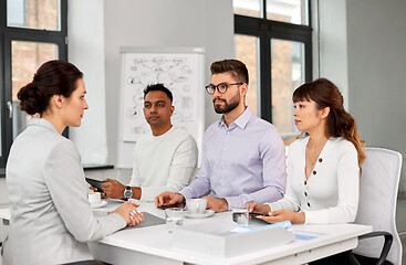 Image showing recruiters having job interview with employee