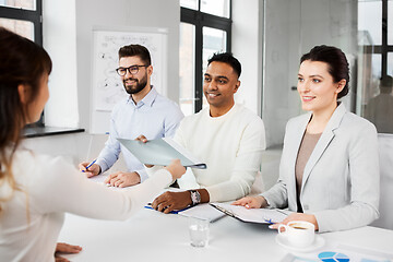 Image showing recruiters having job interview with employee