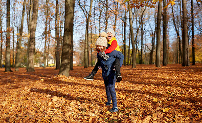 Image showing happy children having fun at autumn park