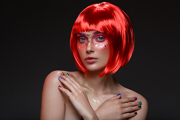 Image showing Beautiful girl in red wig