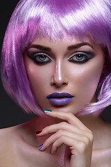 Image showing Beautiful girl in purple wig