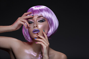 Image showing Beautiful girl in purple wig