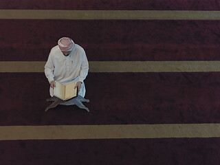 Image showing muslim man praying inside the mosque top view