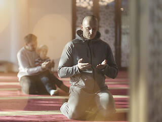 Image showing muslim people praying in mosque