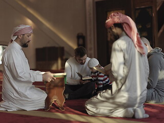 Image showing muslim people in mosque reading quran together