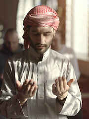 Image showing muslim people praying in mosque