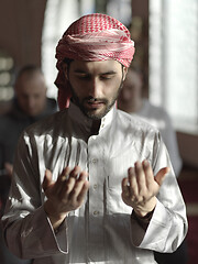 Image showing muslim people praying in mosque