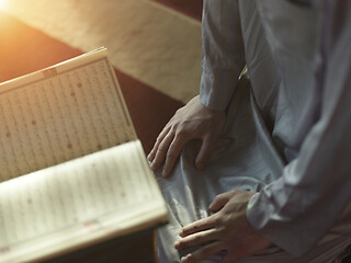 Image showing muslim man praying inside the mosque