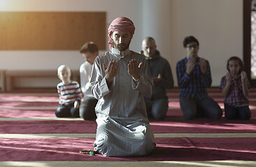 Image showing muslim people praying in mosque