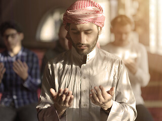 Image showing muslim people praying in mosque