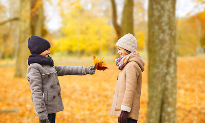 Image showing smiling children in autumn park