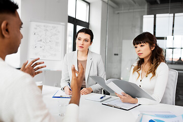 Image showing recruiters having job interview with employee