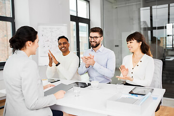 Image showing recruiters having job interview with employee