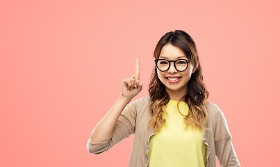 Image showing asian woman in glasses or student with finger up