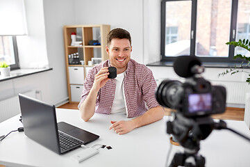 Image showing male blogger with smart speaker videoblogging