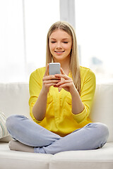 Image showing young woman or teen girl with smartphone at home