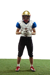 Image showing American football player in action isolated on white studio background