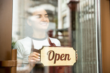 Image showing Open sign on the glass of street cafe or restaurant