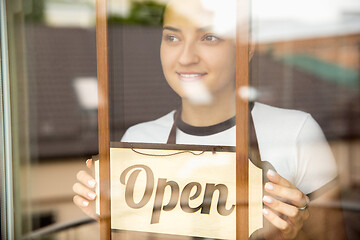 Image showing Open sign on the glass of street cafe or restaurant