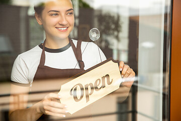 Image showing Open sign on the glass of street cafe or restaurant