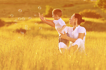 Image showing woman child bubble