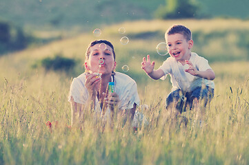 Image showing woman child bubble