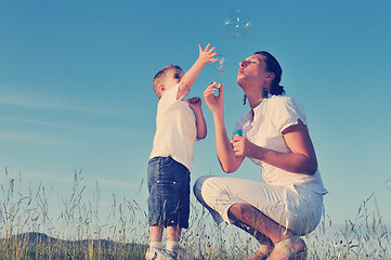 Image showing woman child bubble