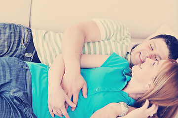 Image showing couple relax at home on sofa