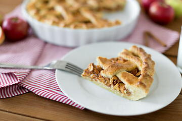 Image showing close up of apple pie and fork on plate