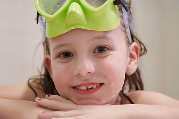 Image showing little girl with snorkel goggles