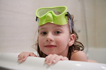 Image showing little girl with snorkel goggles