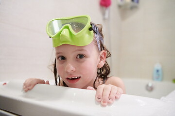 Image showing little girl with snorkel goggles