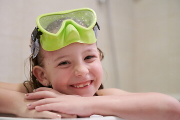 Image showing little girl with snorkel goggles