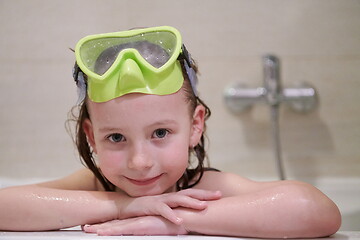 Image showing little girl with snorkel goggles