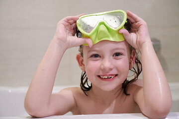 Image showing little girl with snorkel goggles