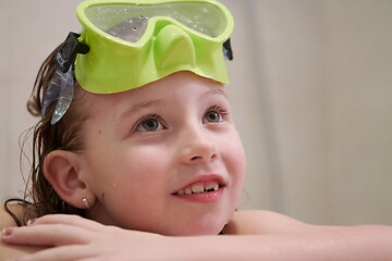 Image showing little girl with snorkel goggles