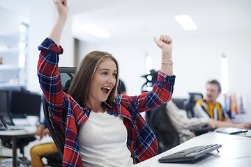 Image showing casual business woman celebrating success