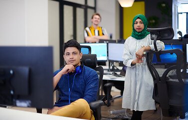 Image showing Multiethnic startup business team with Arabian woman