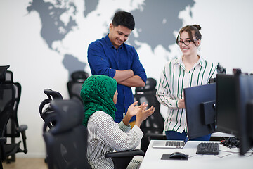 Image showing Multiethnic startup business team with Arabian woman