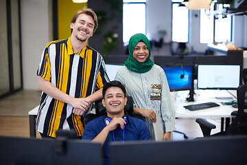 Image showing Multiethnic startup business team with Arabian woman