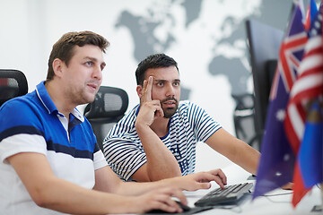 Image showing two male software developers working on computer