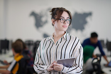 Image showing portrait of businesswoman holding tablet computer