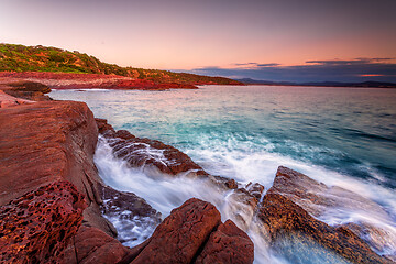 Image showing Early morning on the rich red rocky coast of Eden