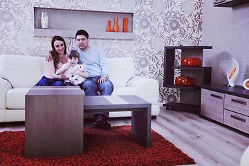 Image showing happy young family at home