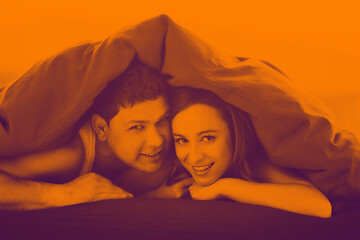 Image showing young couple in bed