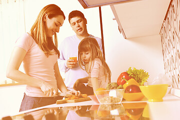 Image showing happy young family in kitchen