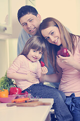 Image showing happy young family in kitchen