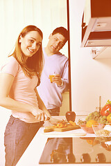 Image showing couple have fun and preparing healthy food in kitchen